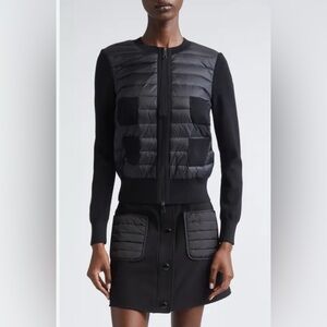 Neiman Marcus bought Black Quilted Women's Jacket with ribbed sleeves